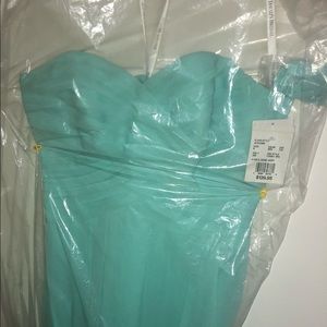 light blue, knee length dress.